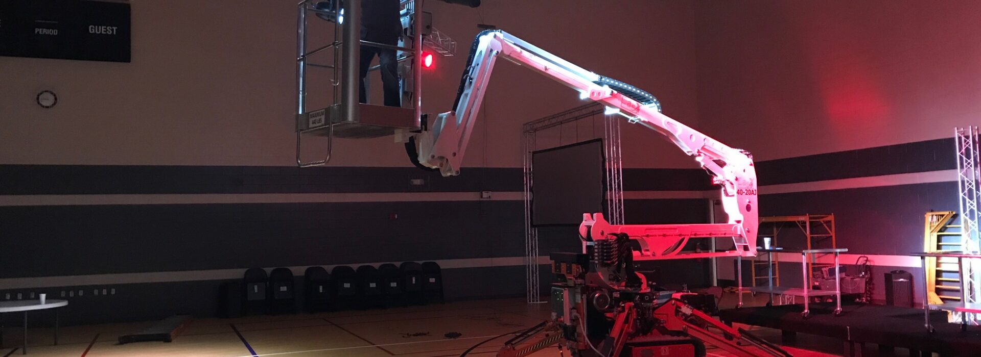 Photo of Easy Lift 40-20AJ spider lift working inside a gymnasium